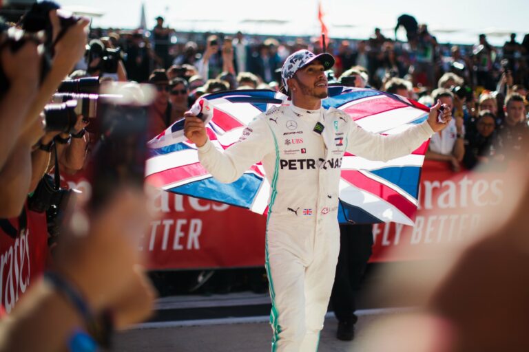 Hamilton eyes Schumacher’s record as Mercedes goes black against racism
